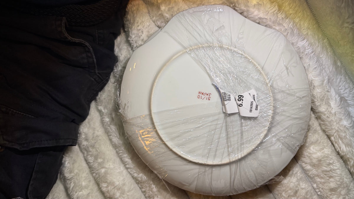 Underside of pink rose plate marked Japan 31/10 in original wrapping
