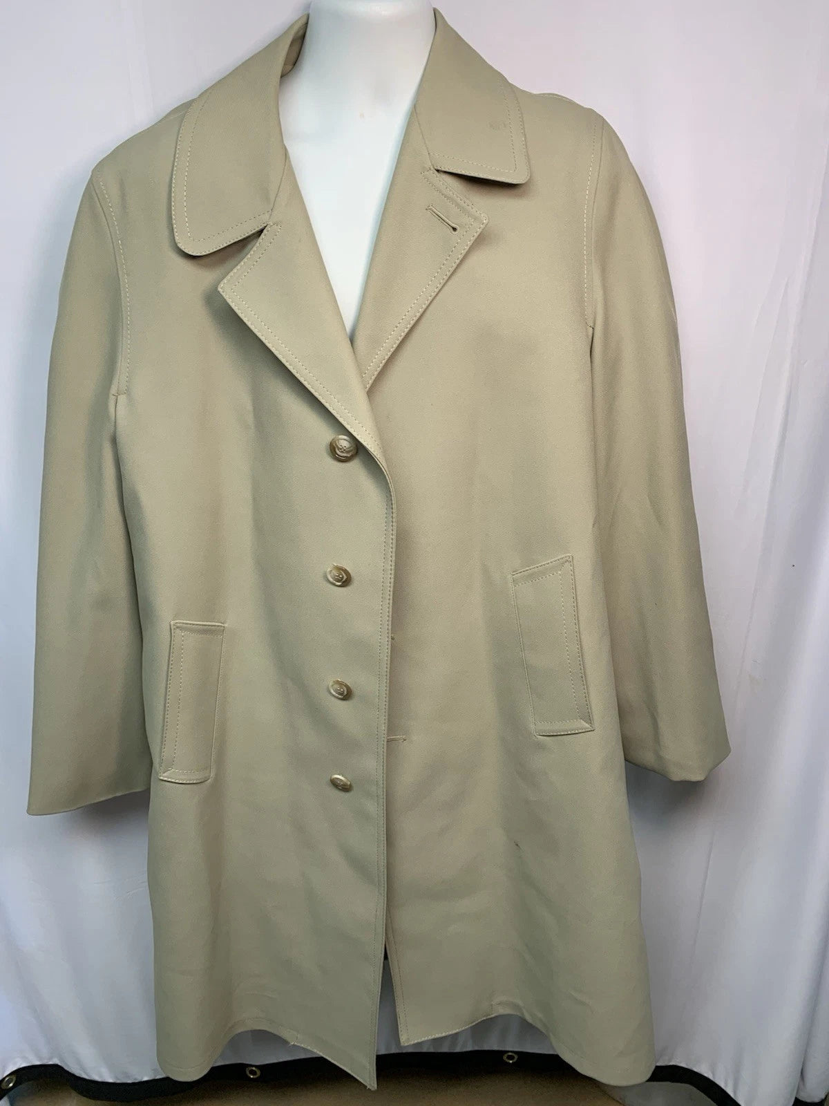 Reference photograph from another Botany 500 beige 46 Long removable-liner coat listing; the actual pre-owned coat is shown second. Exact production year is unverified.