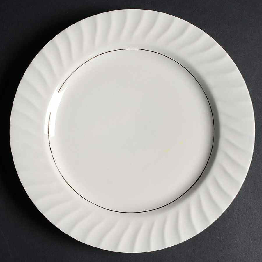 Totally Today TTO16 white swirl-rim plate catalog pattern reference; actual plate is shown in the second photo. Diameter is unmeasured.